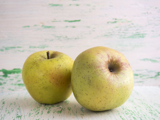 Apples on wooden background