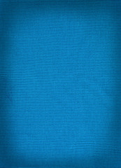 knitted woolen fabric blue color for the background. wool  textu