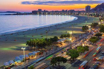 Sunset view of Copacabana beach and Avenida Atlantica in Rio de Janeiro, Brazil