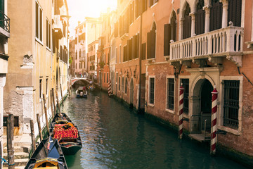 Fototapeta na wymiar Canal with gondolas in Venice. Italy