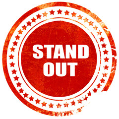 stand out, grunge red rubber stamp on a solid white background