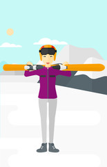 Woman holding skis.