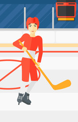 Obraz premium Ice-hockey player with stick.