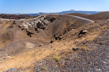 Pamoramic view around Chimney of volcano in Nea Kameni island near Santorini, Cyclades, Greece