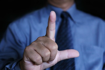 businessman use finger click the air