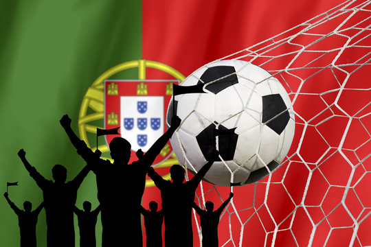 silhouettes of Soccer fans with flag of Portugal .Cheer Concept