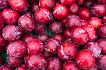 Ripe Plums Background.  Fresh ripe red plums