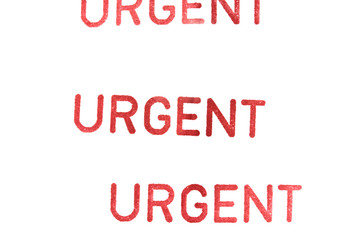 urgent rubber stamp on paper - 107714036