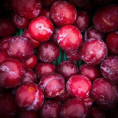 Ripe Plums Background.  Fresh ripe red plums