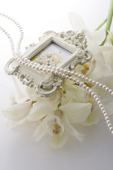 フォトフレームと真珠の背景素材