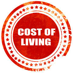 cost of living, grunge red rubber stamp on a solid white backgro