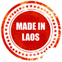 Made in laos, grunge red rubber stamp on a solid white backgroun