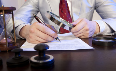 Notary signs the documents from our office