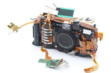 Disassembled camera with exposed copper ribbons