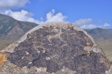 Ancient drawings on mountain rocks
