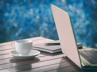 Cup of coffee and  laptop