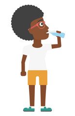 Woman drinking water.
