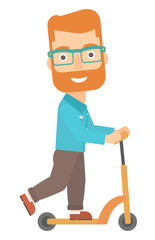 Man riding on scooter.