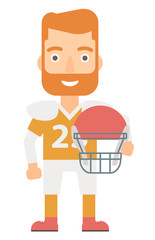 Rugby player with ball and helmet in hands.