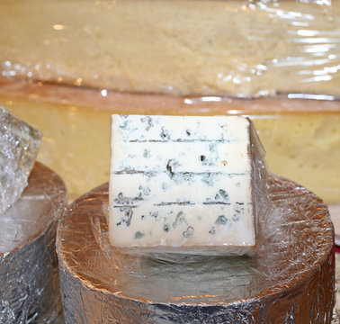 smelly Gorgonzola cheese typical of northern Italy on sale