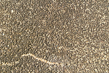 Pebble stone textured wall as background