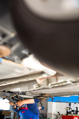 Inside a garage - changing wheels/tires 