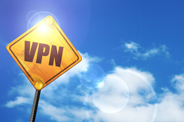 Yellow road sign with a blue sky and white clouds: vpn