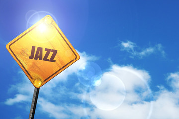Yellow road sign with a blue sky and white clouds: jazz music