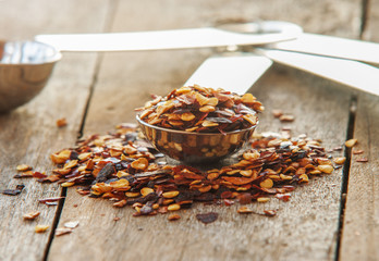 Flakes of red hot chili peppers with garlic
