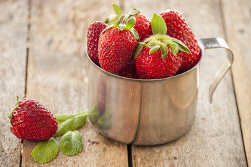strawberries in silver cup