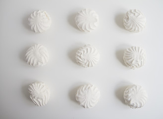Top view of Latvian marshmallovs - zefiri on white background