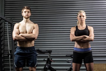 Fototapeta premium Serious crossfit couple posing 