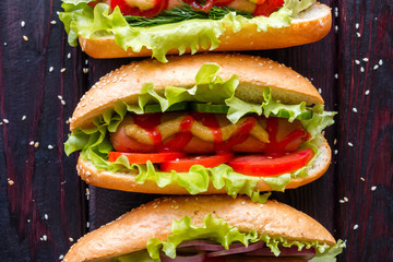 hot dog on a black background closeup