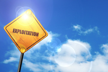 Yellow road sign with a blue sky and white clouds: Exploitation 