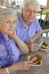Senior couple having lunch
