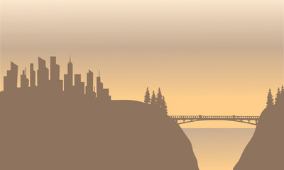 Silhouette of city and bridge