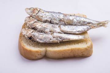 fried sardines on the plate