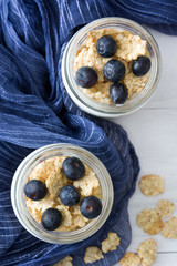 Yogurt with fresh blueberries and cereals

