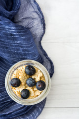 Yogurt with fresh blueberries and cereals

