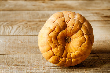 Pumpkins on wooden background