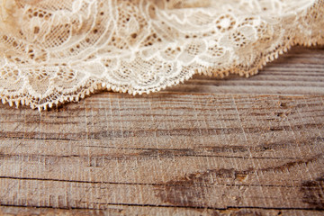 Old boards covered with beautiful lace