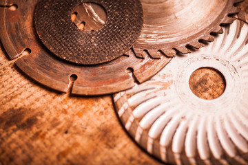 Cutting disks on wooden plank