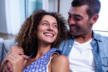 Happy couple smiling and embracing