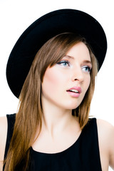 close-up portrait of a beautiful woman wearing hat on white background