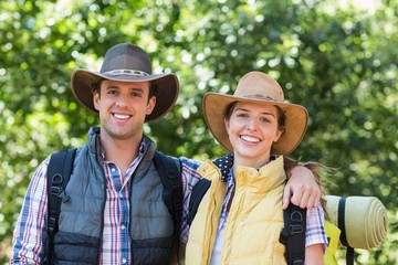 Portrait of happy couple during hiking 