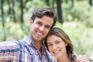 Fototapeta premium Portrait of smiling young couple