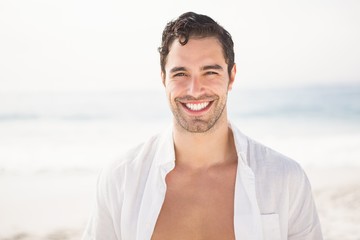Portrait of smiling man on the beach
