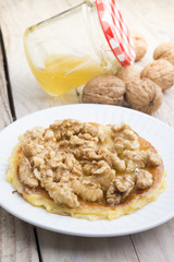 Pancakes with walnut and caramel for a breakfast
