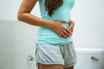 Woman touching her belly