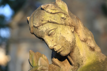 Stone Girl on Tomb from old Prague Cemetery, Czech Republic
